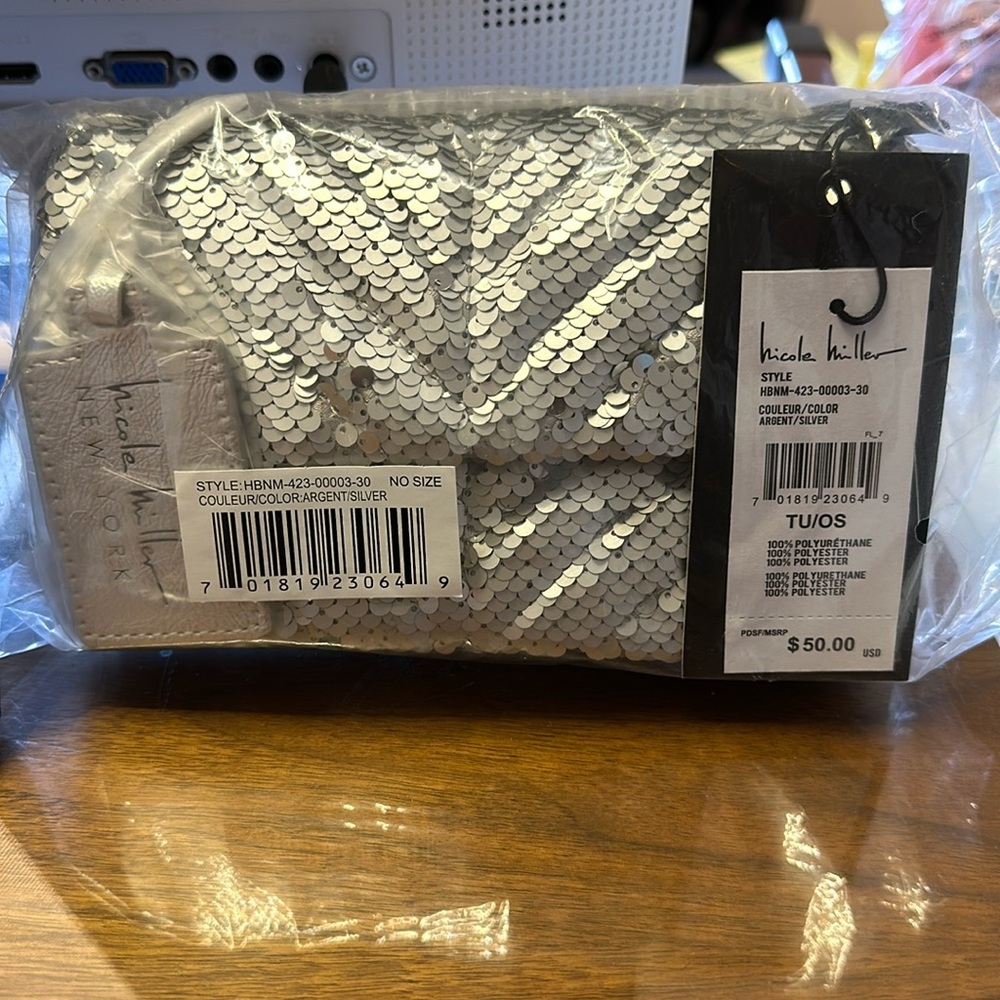 Nicole miller new with tags sizes small purse sliver